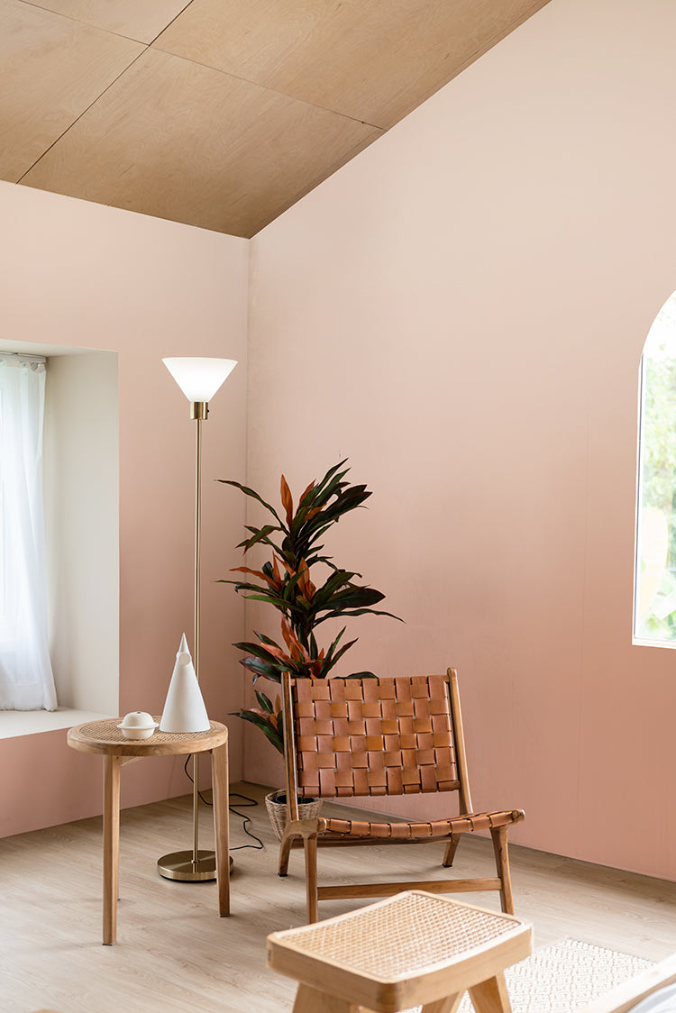 Pink living room wallpaper with soft faded ombre gradient creating a calm interior