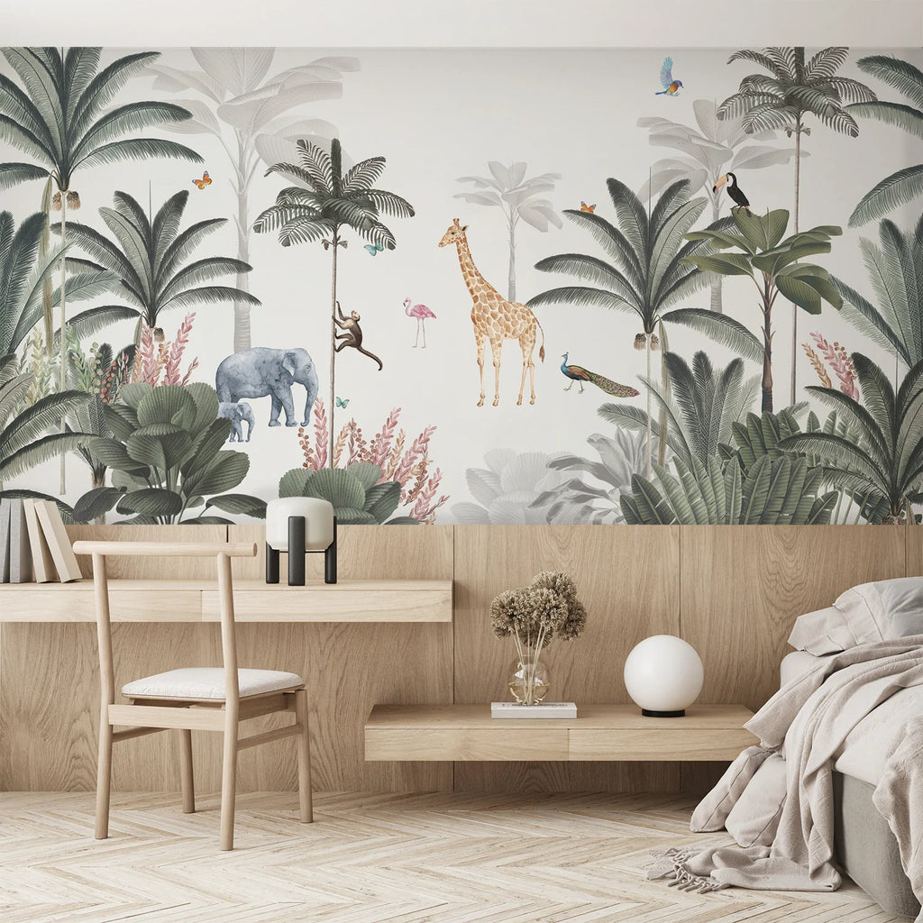 Lush Kingdom watercolour jungle wallpaper with giraffes and palms behind a light timber desk and daybed