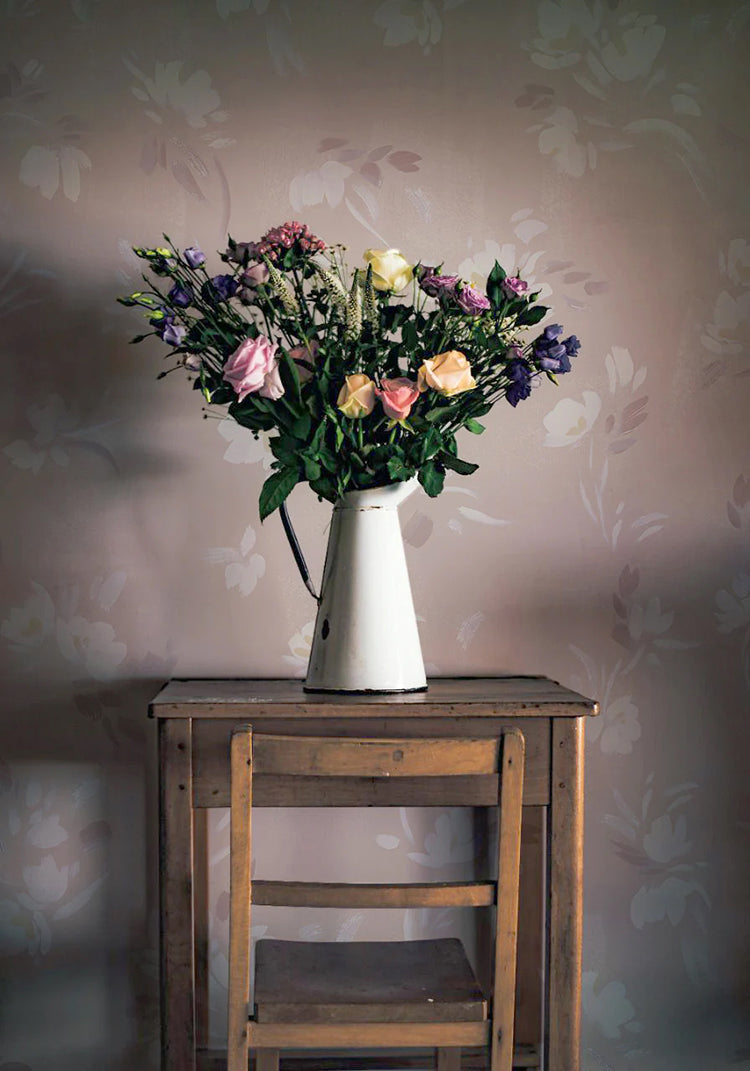 Watercolour floral pattern wallpaper in soft nude tones