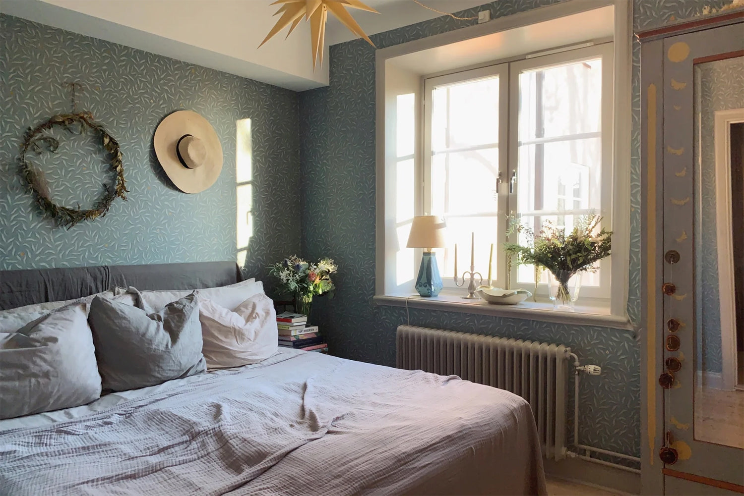 Karolina Foliage, Pattern Wallpaper with delicate trailing leafy motifs in soft green
