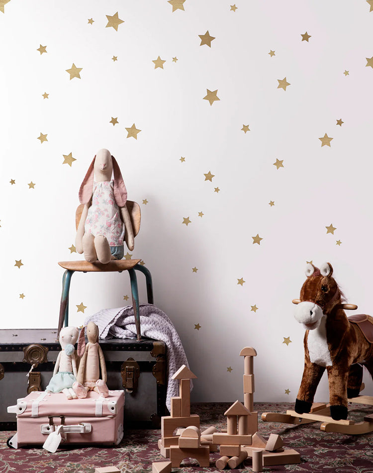 Peel and stick nursery wallpaper with colourful star pattern on white background