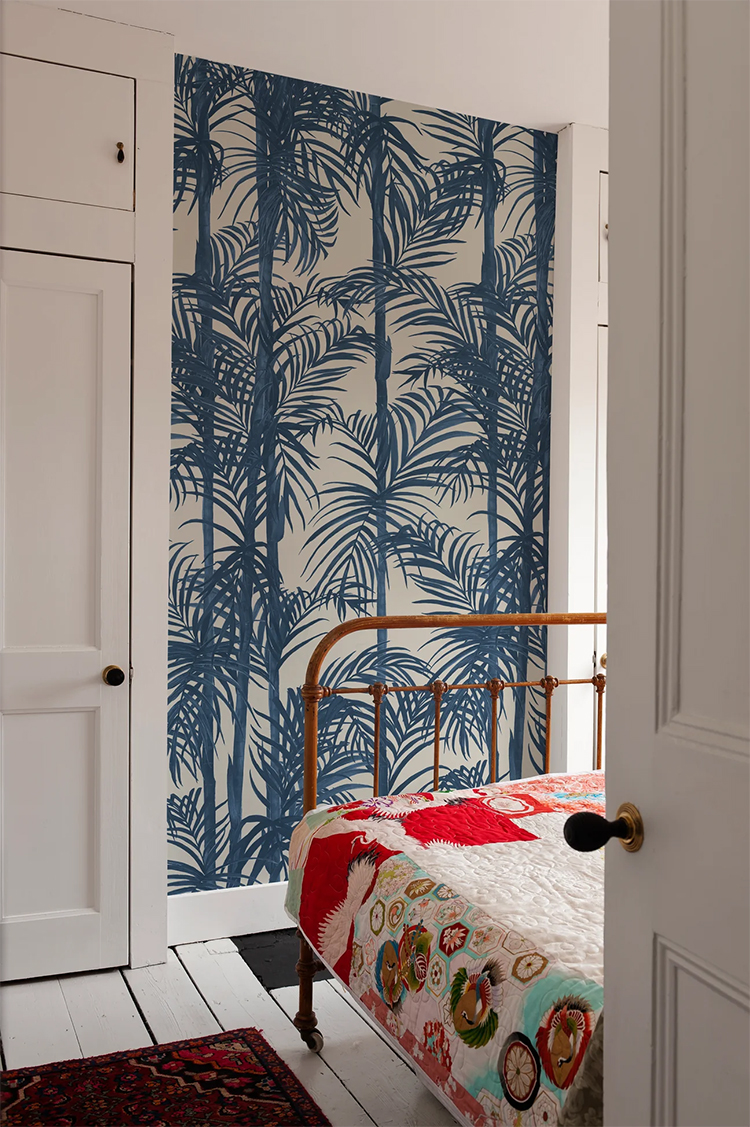 Bamboo Tropical pattern dark blue wallpaper creating calm botanical interior