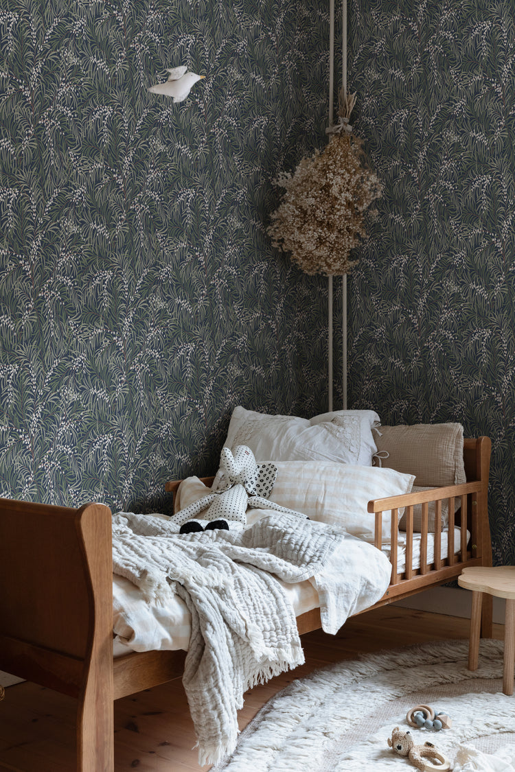 Small pattern dark wallpaper with delicate tropical motifs in dark blue tones