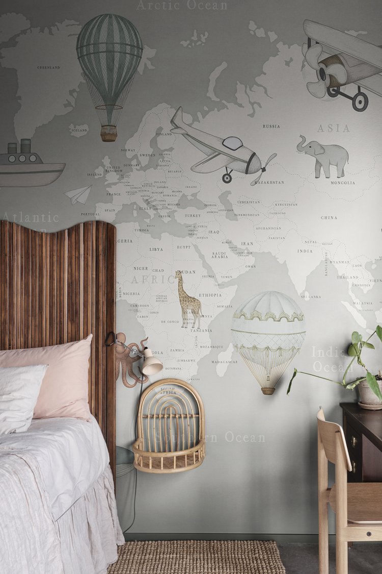 Light grey bedroom mural wallpaper featuring a playful world map design