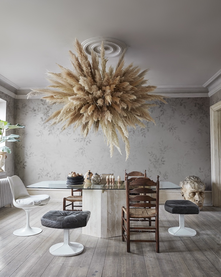 Daydream Botanical Mural Wallpaper with hand-painted foliage in soft, layered tones.