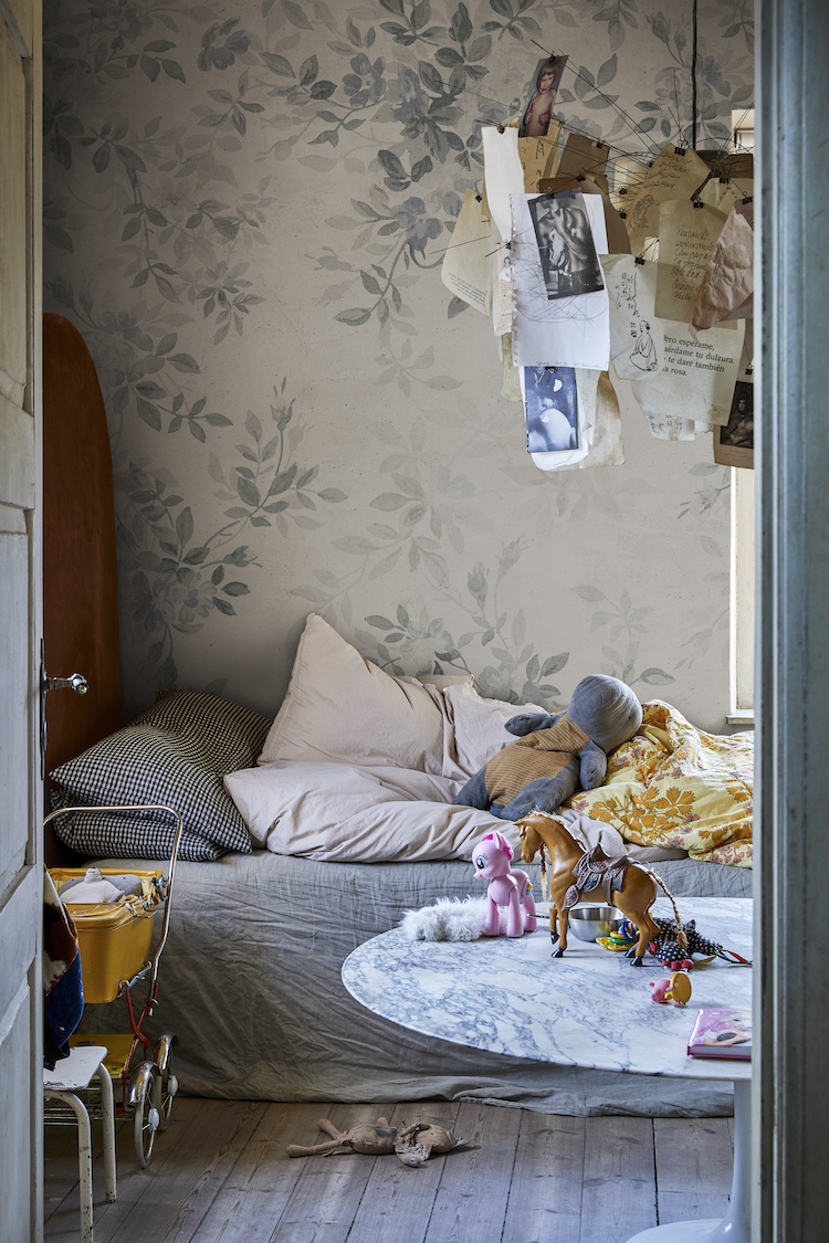 Daydream Botanical Mural Wallpaper with hand-painted blue floral detailing