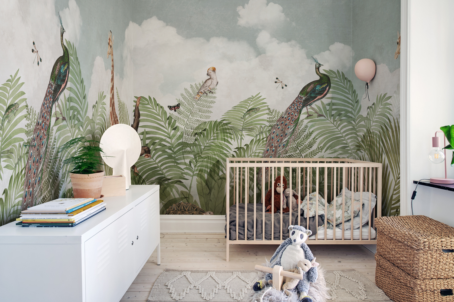 Wild Haven animal wallpaper murals in a nursery featuring gentle forest animals and soft pastel tones