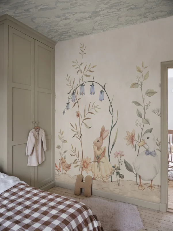 Animal baby girl wallpaper with soft illustrated mural design