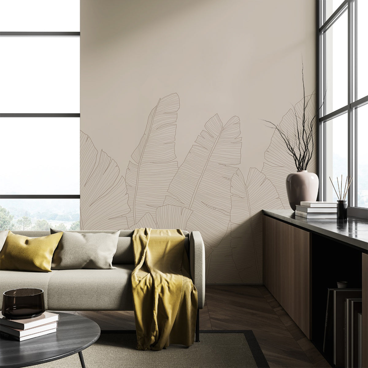 Tropical banana leaf mural in beige tones styled in a light-filled living room.